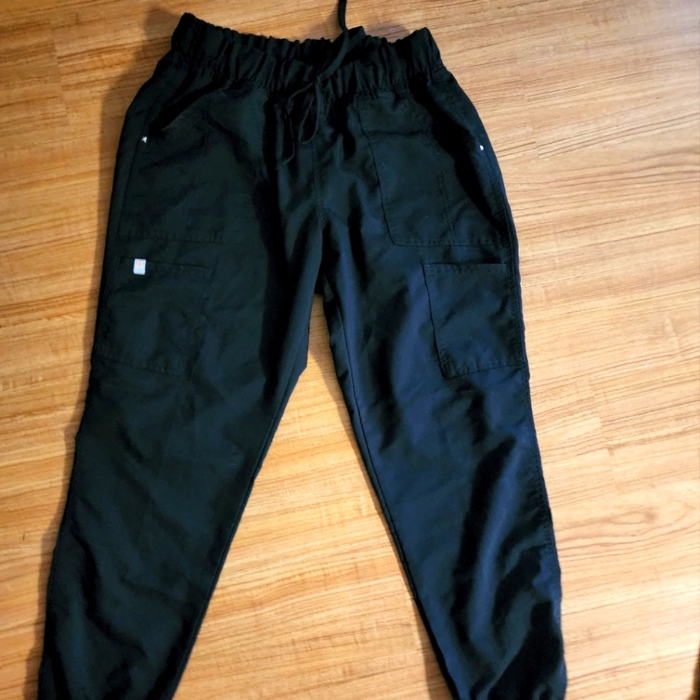 Woman's black scrub pants.